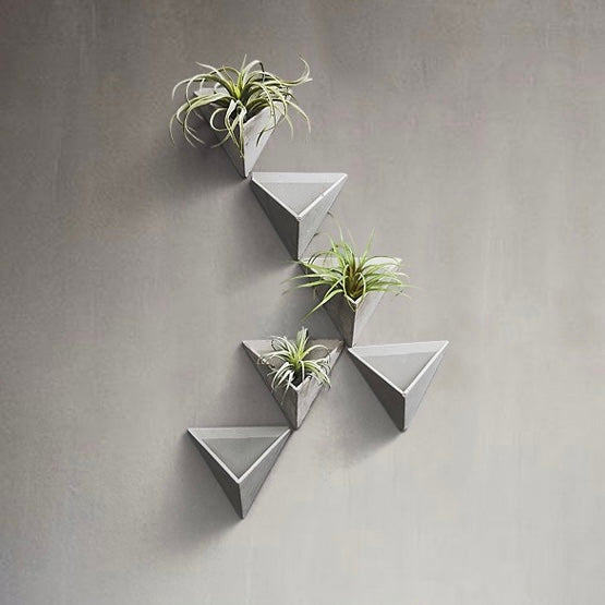 اواني نباتات خرسانية معلقة