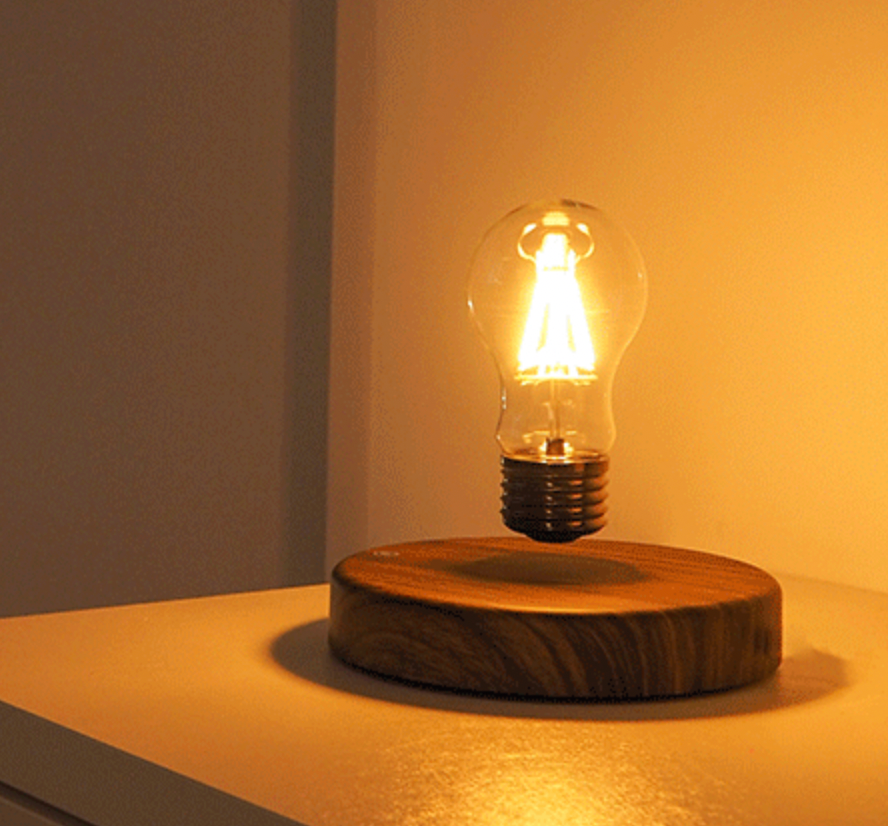 مصباح عائم مغناطيسيا مع قاعدة خشبية